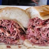 Pastrami Sandwich · 1/2 lb. of lean pastrami, pickles and mustard on a french roll.
