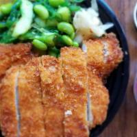 Chicken Katsu Bowl · So crispy and juicy katsu patties are served on a bed of rice along with seaweed salad, edam...