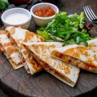Quesadilla · Fajita chicken with onion, green pepper and served with sour cream and fire roast salsa