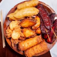 Pu-Pu For 2 · Appetizer platter to satisfy all:  2 egg rolls,  2 pieces of beef teriyaki, 2 spare ribs, 4 ...