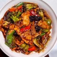 Chicken In Garlic Sauce · Slices of white meat chicken sautéed with assorted vegetables in a spicy but sweet dark sauce