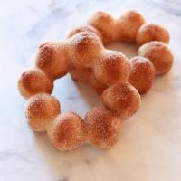 Churro Mochi Donut · A California Classic! Our mochi donut with a generous coating of cinnamon and sugar.