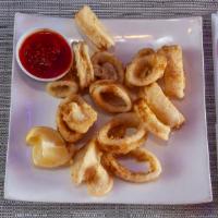Fried Calamari · Fresh cut octopus sections, expertly and lightly flash fried for that perfect non-chewy resu...
