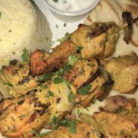 Chicken Kabob · Three skewers of tender marinated chicken, grilled and baked to juicy and savory perfection....