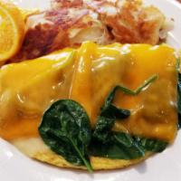 Fresh Spinach Omelette · Crispy bacon, tomato, red onions and cheddar cheese. Served with home fries hash browns, toa...