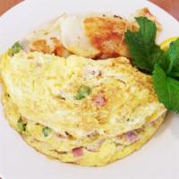 Denver Omelette · Diced ham, bell peppers and onions. Served with home fries hash browns, toast or a fresh bak...