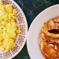 Cinnamon Roll French Toast Combo · Cinnamon roll french toast, two eggs, choice of ham, bacon (4), or link sausage (4).all topp...