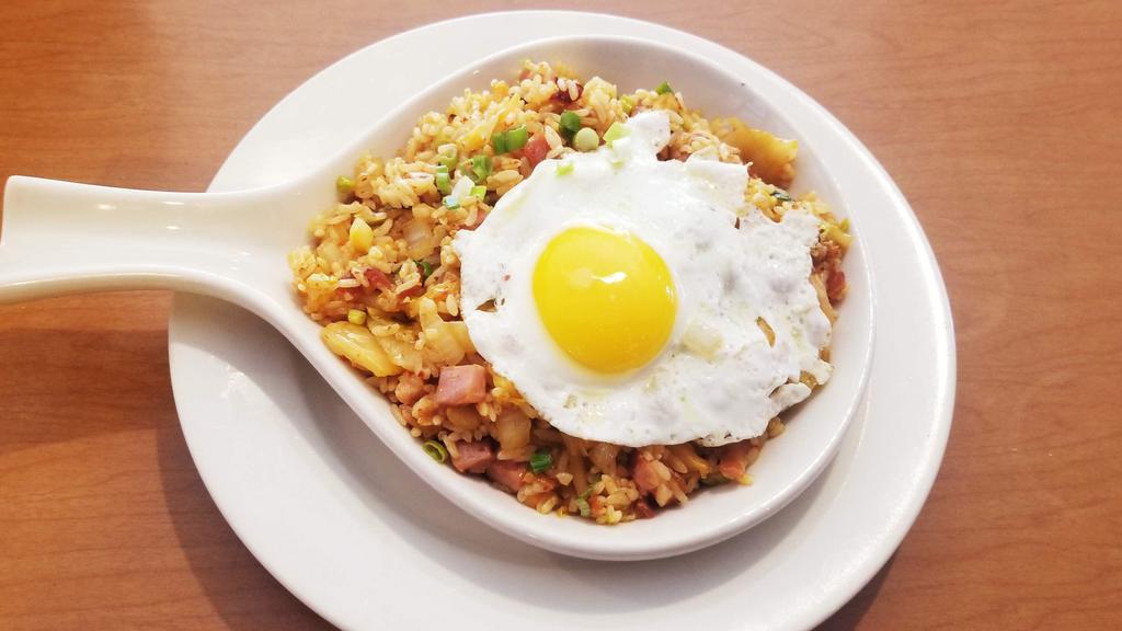 Kimchi Fried Rice · Kimchi, Rice, Carrot, Onion, Egg Served with soup.