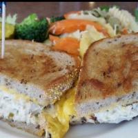 Tuna Melt Sandwich · Albacore tuna salad and melted cheese grilled on rye bread. Served with potato salad, cole s...