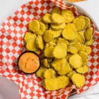 Fried Pickles · Dill pickle slices dipped in a spicy batter and served with our cajun remoulade.
