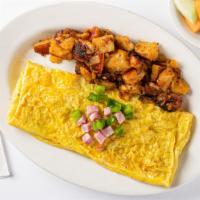 Western Omelette · Chopped ham, sauteed peppers, onions and cheese.