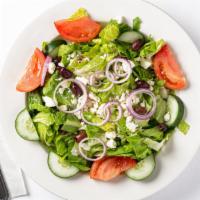 Greek Salad · Romaine lettuce, tomatoes, cucumbers, peppers, onions, kalamata olives and feta cheese.