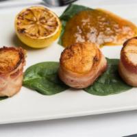 Bacon Wrapped Sea Scallops · (3) Scallops wrapped in Bacon served with Apricot Chutney.