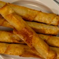 Cigar Borek · Cigar-sized, deep-fried tubes of rolled pastry filled with white cheese and chopped dill.