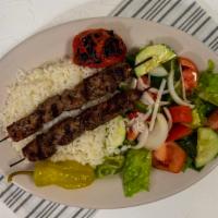 Beef Shish Kebab · Chunks of beef grilled on a skewer, served over rice.