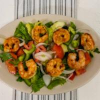 Shrimp Salad · Fresh shrimp layered with mixed greens, cucumbers, onions and peppers tossed in our house dr...