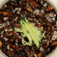 Jjajangmyun · Stir-fried onions, zucchini and cabbage with black bean sauce with pork.