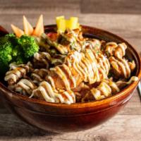 Chicken Teriyaki Dubbap · Fried chicken and assorted vegetables with teriyaki sauce over rice.