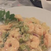 Shrimp Marinara · Served over pasta.