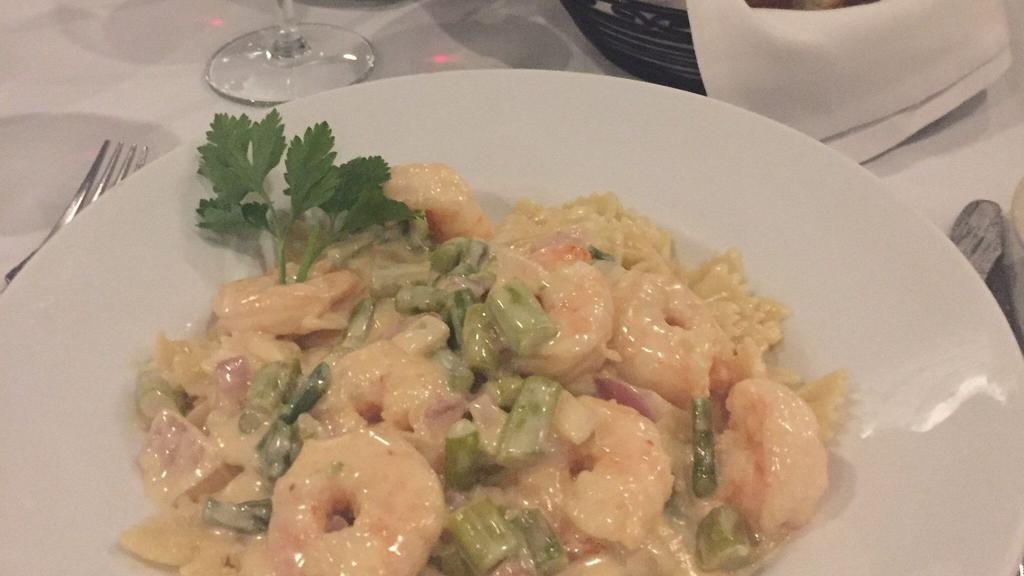Shrimp Marinara · Served over pasta.