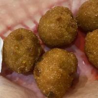 Hush Puppies (10) · served with honey butter