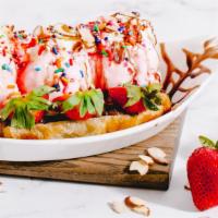 Strawberry Nutella Croissants Icream · Nutella, strawberry ice cream, strawberry, whipped cream, sprinkle, strawberry sauce, conden...