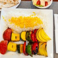 Vegetarian Kabob Entree · Grilled tomatoes, onions, mushroom, zucchini and green peppers.