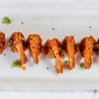 Fire Cracker Shrimp · Fried breaded shrimp tosses on Oishi sweet & spicy firecracker sauce & topped with chives.
