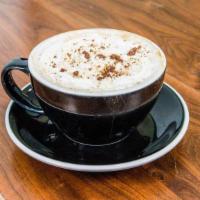 Concha Latte · Coco, cinnamon, a dash of salt with espresso, and a choice of milk topped with concha crumbles