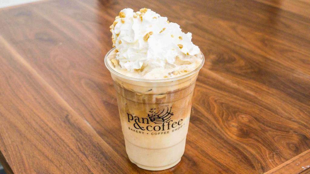 Peanut Butter Latte · Iced only. This creamy latte combines sweet, salty, and savory with our blend of peanut butter, milk, and espresso. Topped with whip cream and peanuts.