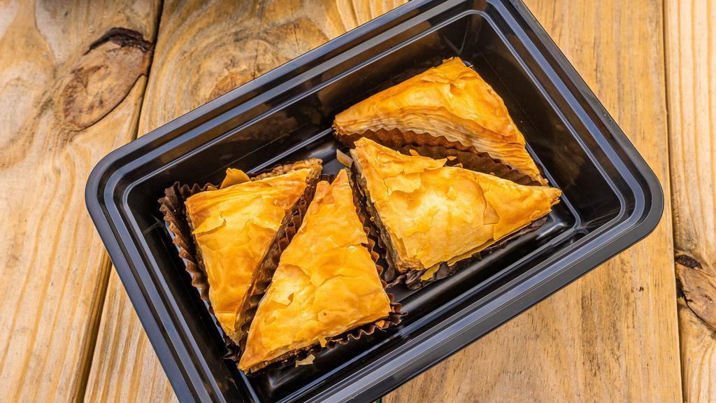 Baklava · Pastry Filo filled with chocolate, nuts and sweetened with honey and syrup