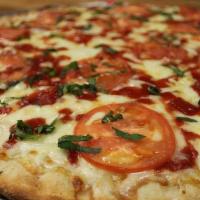 Margherita Pizza · Cheese, sauce, tomatoes and fresh basil.