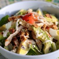 Cobb Salad · Grilled chicken breast, Gorgonzola cheese, bacon, avocado, tomatoes, eggs, romaine lettuce a...