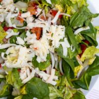 Naked Salad · Iceberg lettuce, spinach, roasted, Sweet peppers, onion, Roma tomato, mozzarella, red wine v...