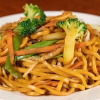 Lo Mein · Stir-fried golden wheat noodle with soy glaze, vegetables, and choice of protein.