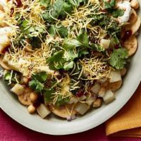 Chaat Papdi · Papdi, potatoes, chickpeas, cilantro, yogurt, mint, and tamarind sauces.