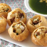 Pani Puri · Vegan. Hollow crispy puffs with potatoes, chickpeas, and tamarind sauce, served with spicy w...