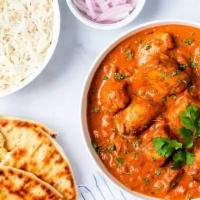 Chicken Tikka Masala · Chicken with bell peppers and onions in tomato and onion gravy.

Served with rice