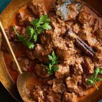 Lamb Rogan Josh · Lamb cooked in onion sauce, seasoned with Kashmiri peppers.

Served with rice