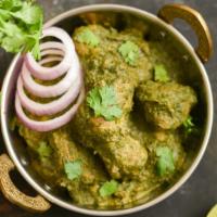 Nilgiri Chicken · Chicken cooked in green curry with coriander, mint and coconut.

Served with rice
