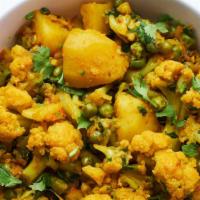 Aloo Gobhi Matar · Vegan, gluten free. Potato, cauliflower, and peas. Vegetarian.

Served with rice.