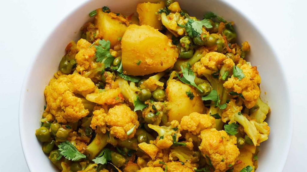 Aloo Gobhi Matar · Vegan, gluten free. Potato, cauliflower, and peas. Vegetarian.

Served with rice.