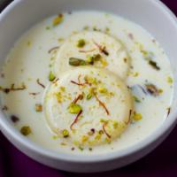 Ras Malai · Sweet paneer soaked in cream flavored with cardamom