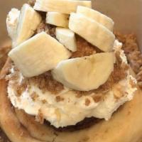Banana Cream Pie Roll · Banana frosting: topped with freshly sliced bananas and pie crumble.