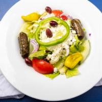 Greek Salad · Romaine lettuce, tomatoes. cucumber, kalamata olives, pepperoncini, onions, green peppers, s...