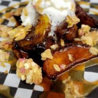 Zapple Bites · Fried apples tossed in cinnamon sugar spice, topped with caramel, whipped cream, and granola.