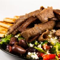 Papou'S Gyro Salad · A big greek salad with shaved gyro meat.