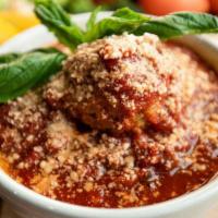 Meatballs · Five meatballs served with homemade sauce and bread.