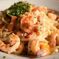 Shrimp Scampi · Spicy marinara with roasted scampi, garlic-butter sauce with white wine, and chopped parsley.