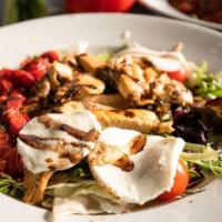 Chicken Mozzarella Salad · Mixed greens topped with fresh mozzarella, grilled chicken, roasted pepper topped with drizz...